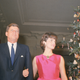 Illustration for article titled 70 Years of First Ladies Standing in Front of Christmas Trees